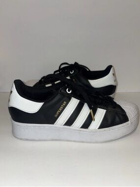 adidas Superstar Black with White Stripes and Gold Accents